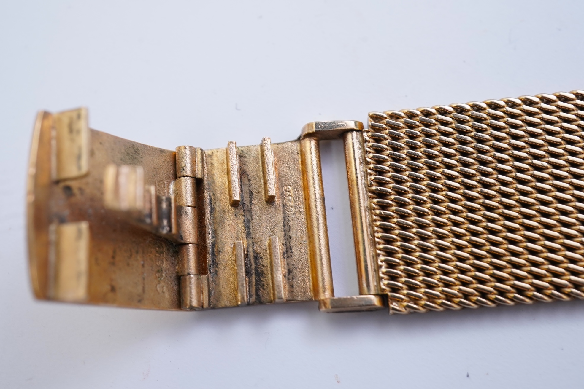A gentleman's late 1960's 18ct gold Omega Constellation Automatic Chronometer Officially Certified wrist watch, on an associated 9ct gold mesh link bracelet